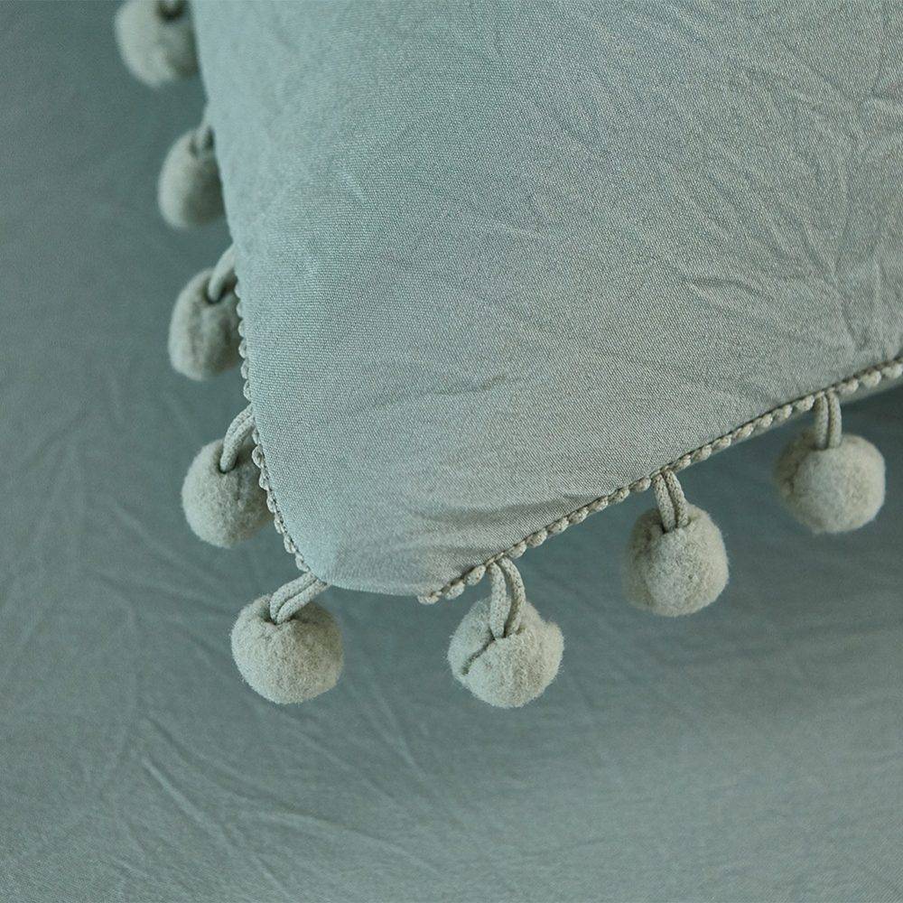 solid pastel soft pastel green pillows close up