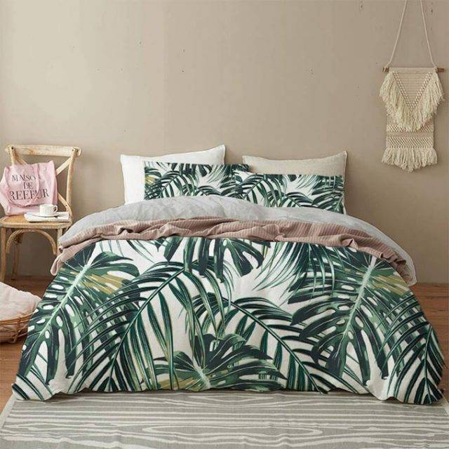 Botanical bedspread with dark palm leaf pattern